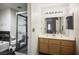 Bathroom featuring a vanity, sink, shower, and tub at 9357 Golden Timber Ln, Las Vegas, NV 89117