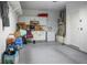Clean garage with shelving and storage cabinets at 9357 Golden Timber Ln, Las Vegas, NV 89117