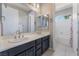 Bathroom featuring double sinks, a large mirror, and a tub/shower combo at , Las Vegas, NV 89149