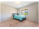 Bedroom featuring a large window and a bed frame with built-in storage at , Las Vegas, NV 89149