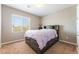 Bedroom with a large window and a bed frame with built-in storage at , Las Vegas, NV 89149