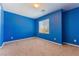 Bedroom featuring a large window and bright blue painted walls at , Las Vegas, NV 89149