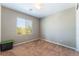 Empty bedroom with neutral walls, carpet, and a window providing natural light at , Las Vegas, NV 89149