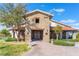 Attractive exterior of the clubhouse with stone accents, decorative lighting, and well-maintained landscaping at , Las Vegas, NV 89149