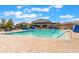 Large, inviting community pool area perfect for relaxation and recreation on a sunny day with clear blue skies at , Las Vegas, NV 89149