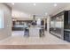 Open kitchen with stainless steel appliances, large island, and barstool seating, perfect for entertaining at , Las Vegas, NV 89149