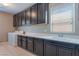 Laundry room with washer, dryer, and built-in storage cabinets at , Las Vegas, NV 89149