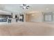 Bright and open living room flows into a modern kitchen with stainless steel appliances at , Las Vegas, NV 89149