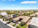 An aerial view highlights this home's location near community amenities and lush green spaces at 10331 Rio De Thule Ln, Las Vegas, NV 89135