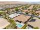 An aerial view showcases this home's backyard pool and convenient neighborhood location at 10331 Rio De Thule Ln, Las Vegas, NV 89135
