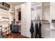 Organized walk-in closet features custom shelving, hanging rods, and ample storage space at 10331 Rio De Thule Ln, Las Vegas, NV 89135