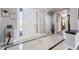 Elegant foyer with marble floors, decorative art, and a view into the home's interior at 10331 Rio De Thule Ln, Las Vegas, NV 89135