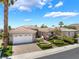 Charming single-story home featuring manicured landscaping and a brick-paved driveway at 10331 Rio De Thule Ln, Las Vegas, NV 89135