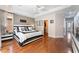 This home features a large main bedroom with beautiful hardwood floors and a walk in closet at 10331 Rio De Thule Ln, Las Vegas, NV 89135