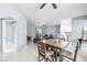 Spacious open-concept living area with kitchen and dining, perfect for entertaining at 109 Breezy Tree Ct # 202, Las Vegas, NV 89145