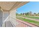 Balcony overlooking green space and the surrounding walking path, enhancing the outdoor experience at 1201 Bourbon St, Pahrump, NV 89048