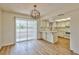 Eat-in kitchen area with stainless steel appliances and sliding door to backyard at 1201 Bourbon St, Pahrump, NV 89048