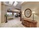 Elegant foyer with tile flooring, coffered ceiling, and views into the open-concept living areas at 1641 Rockcrest Hills Ave, Henderson, NV 89052