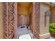 Charming front entrance featuring decorative ironwork and a welcoming double door at 1641 Rockcrest Hills Ave, Henderson, NV 89052