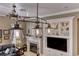 Cozy living room features a fireplace, custom built-ins, and modern lighting at 1641 Rockcrest Hills Ave, Henderson, NV 89052