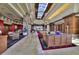 Grand lobby with marble floors, skylight, and comfortable seating areas exudes elegance at 1641 Rockcrest Hills Ave, Henderson, NV 89052