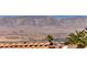 Breathtaking mountain views beyond the roof of this beautiful desert home at 1641 Rockcrest Hills Ave, Henderson, NV 89052