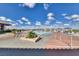 Expansive pool area with sun loungers and umbrellas offers resort-style relaxation at 1641 Rockcrest Hills Ave, Henderson, NV 89052