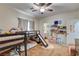 Bright ' room features a lofted bed with slide, and colorful decorations for a fun, creative space at 1717 Jake Andrew Ave, North Las Vegas, NV 89086