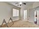 Versatile bedroom with a ceiling fan and ample natural light, providing a blank canvas for personalization at 1717 Jake Andrew Ave, North Las Vegas, NV 89086