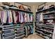 Walk-in closet complete with ample storage options and shelving at 1717 Jake Andrew Ave, North Las Vegas, NV 89086
