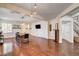 Open dining room space with hardwood floors and decorative wall paneling at 1717 Jake Andrew Ave, North Las Vegas, NV 89086
