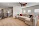 Large living room features a spacious sectional sofa, providing ample seating for relaxing and entertaining at 1717 Jake Andrew Ave, North Las Vegas, NV 89086