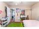 Comfortable bedroom showcasing ample space, natural light, and hardwood-look flooring at 1723 Candice St, Las Vegas, NV 89156