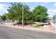 Charming single-story home with a well-maintained lawn and mature trees in the front yard at 1723 Candice St, Las Vegas, NV 89156