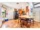 Well-lit kitchen with stainless steel appliances and stone countertops with seating at 1723 Candice St, Las Vegas, NV 89156