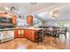 Open kitchen with stone countertops, seating and seamlessly connects to the dining and living areas at 1723 Candice St, Las Vegas, NV 89156