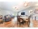 Open-concept living room and dining area featuring tile floors and lots of seating at 1723 Candice St, Las Vegas, NV 89156