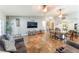 Open-concept living room and dining area featuring tile floors and ample seating at 1723 Candice St, Las Vegas, NV 89156