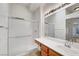 Well-lit bathroom featuring an updated shower with glass door and vanity with a sink at 2059 Joy View Ln, Henderson, NV 89012