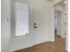 Entryway featuring a window and neutral-colored tile flooring at 2059 Joy View Ln, Henderson, NV 89012
