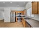 Modern kitchen with stainless steel appliances, ample counter space, and plenty of natural light at 2059 Joy View Ln, Henderson, NV 89012