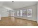 Sun-filled living room with tile floors, patio access, and large windows providing natural light and views at 2059 Joy View Ln, Henderson, NV 89012
