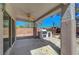 Spacious covered patio, showcasing an outdoor grill and views of the backyard at 2059 Joy View Ln, Henderson, NV 89012