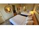 Bright bedroom featuring two queen beds with fresh white linens and comfortable decor at 211 E Flamingo Rd # 405, Las Vegas, NV 89169