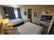 Comfortable hotel room with two beds, sofa, television, and neutral decor at 211 E Flamingo Rd # 405, Las Vegas, NV 89169