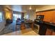 Living room showcasing a modern kitchen with seating and a comfortable sitting area at 211 E Flamingo Rd # 405, Las Vegas, NV 89169