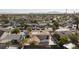 Home in neighborhood with city skyline in the distance at 2112 Los Altos St, Las Vegas, NV 89102