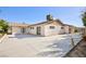 Large backyard with concrete patio, offering ample space for outdoor activities and relaxation at 2112 Los Altos St, Las Vegas, NV 89102