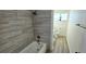 Updated bathroom featuring a shower-over-tub combo and a modern single sink vanity at 2112 Los Altos St, Las Vegas, NV 89102