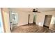Bedroom boasts wood-look floors, a ceiling fan, and multiple closets at 2112 Los Altos St, Las Vegas, NV 89102